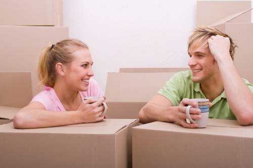 Professional house removalists assisting with packing
