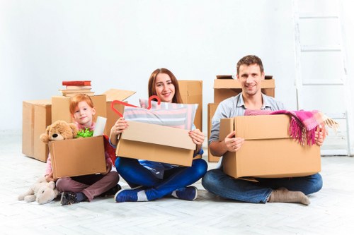 Moving trucks and professionals preparing for a home move in Manandvan Southfields